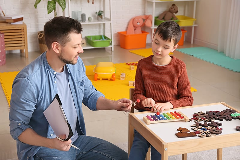 A child participates in ABA therapy.